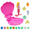 A pink mermaid dive toy featuring an opening shell and a yellow mermaid figure with various colored gems.