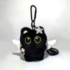 A black plush cat keychain charm with gold eyes and a silver star accent.