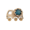 A wooden toy vehicle with a cutout and a circular sensory board featuring blue glitter.