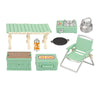 A miniature camping picnic set featuring a wooden table, cooking accessories, and a folding chair in light green.