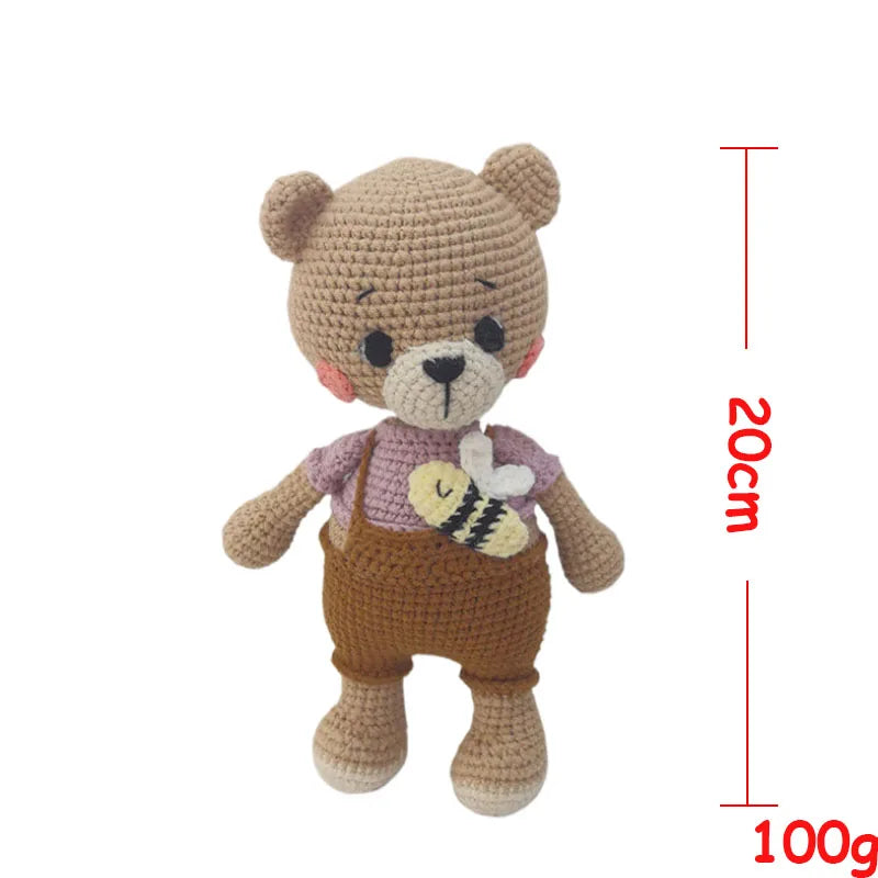 Handmade crochet stuffed bear plush toy in brown and purple tones