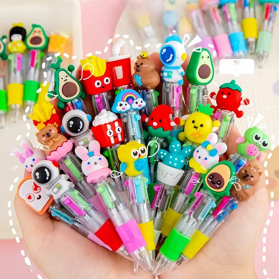 A hand holds a cluster of cute cartoon four-color ballpoint pens in various bright colors and designs.