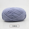 A ball of light purple pre-dyed milk cotton yarn used for knitting and crochet.