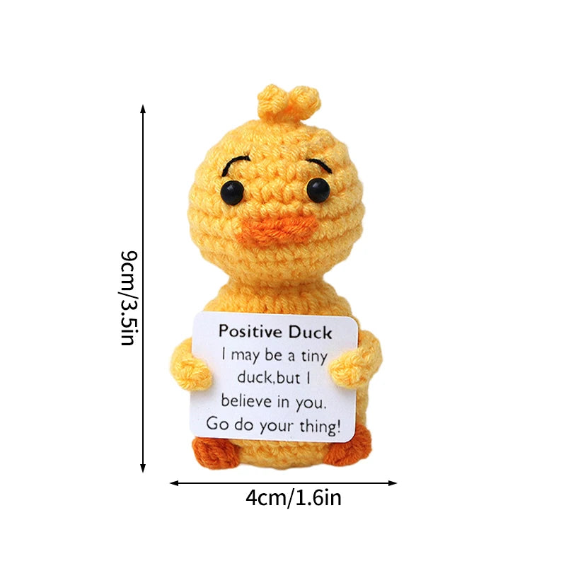 Handmade crochet positive duck doll with an inspirational message