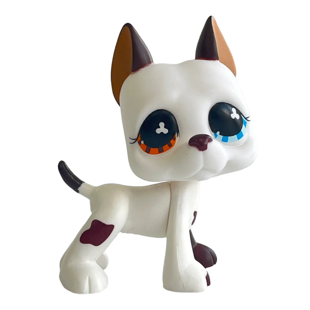 Weiße Sammler-Katzenfigur mit braunen Ohren und dunklen Augen.