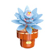 A blue flower-shaped building block set featuring a pink center and a wooden base.
