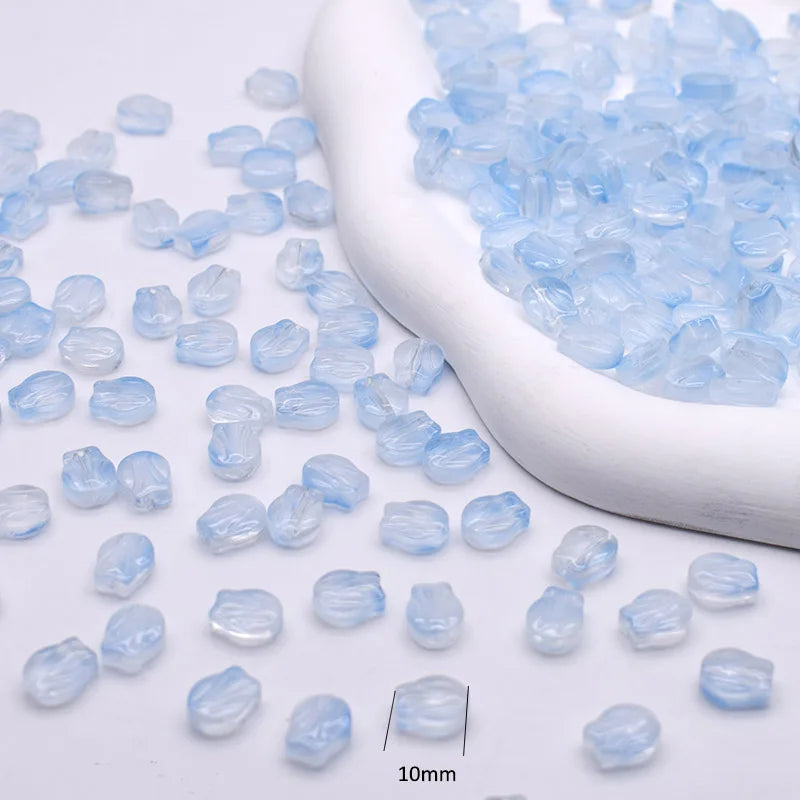 A scoop of light blue gradient glass beads is shown next to individual beads, measuring 10mm.