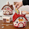 A hand is opening a red house-shaped piggy bank with a lock and key, showing the interior.