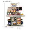 A green kids pretend kitchen play set featuring various cooking utensils and accessories.
