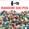 A large pile of random magnetic building tiles in various colors and shapes.