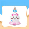 A white plush keychain charm of a smiling character with pink accents and a pink swimming ring.