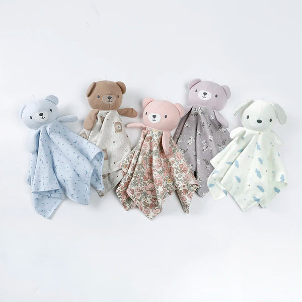 A collection of soft stuffed animal comfort toys in various colors and patterns.