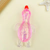 A pink, glittery stretchy duck squeeze toy with a red beak and translucent wings.
