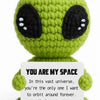 Handmade crochet positive alien pocket hug gift in bright lime green