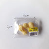 A clear plastic package containing a 1.0kg set of realistic steak, salmon, and bacon rolls for a miniature dollhouse food set