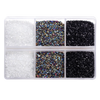A clear plastic container holds three types of crushed glass stones: white, multicolored, and black.