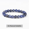 A bracelet made of 5A Natural Sodalite beads in various shades of blue and gray.
