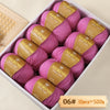 Box of 10 skeins of pink merino wool yarn for knitting, labeled as 500g