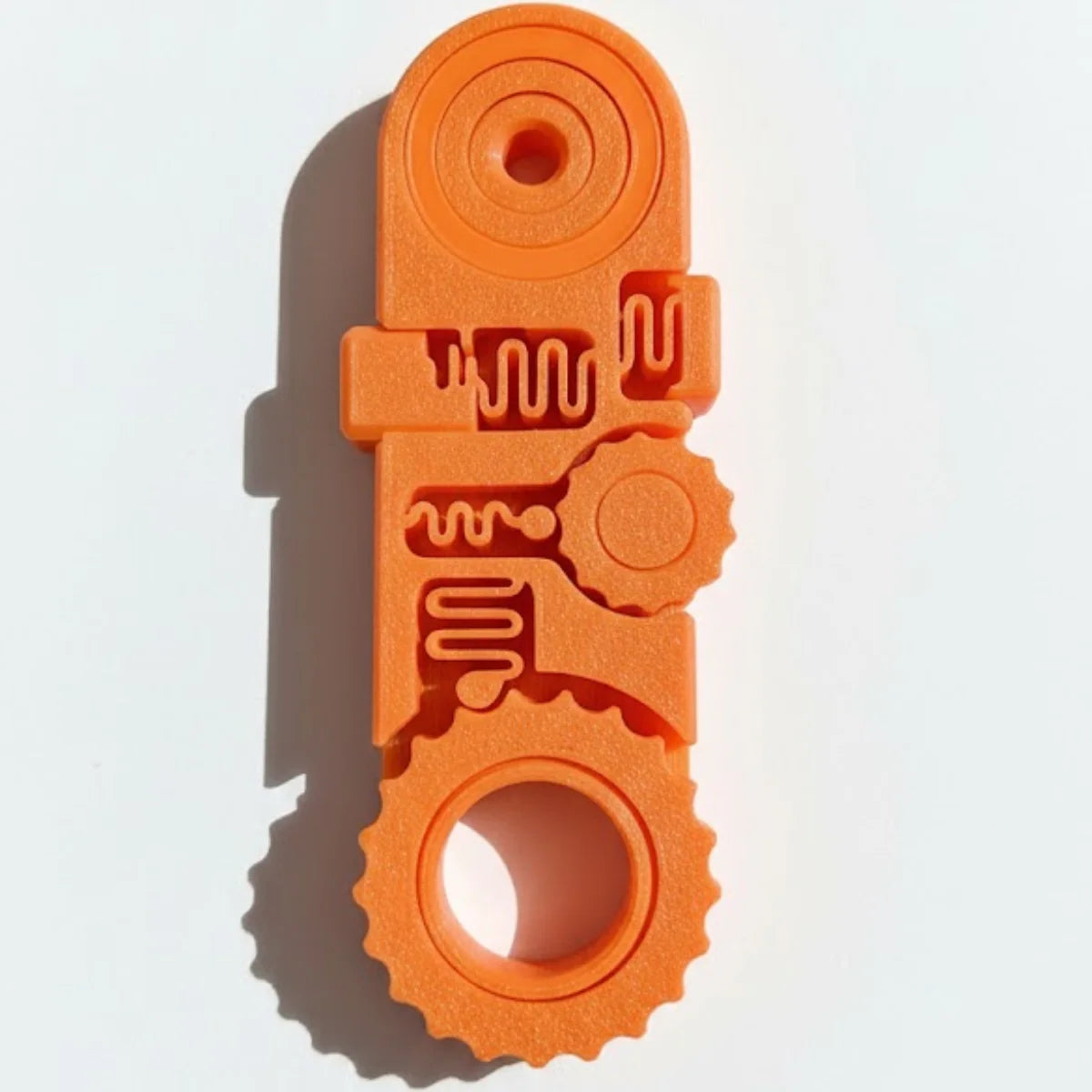 Orange 2-in-1 fidget clicker and spinner keychain for stress relief with various textured elements
