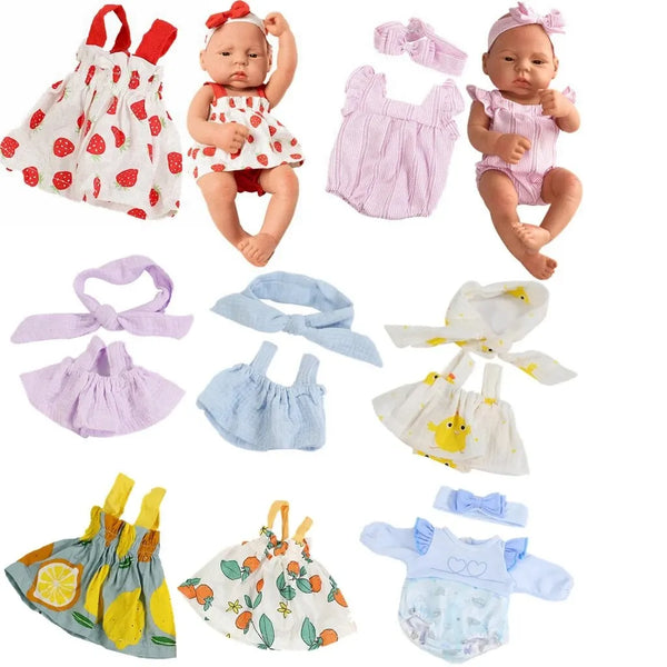A collection of pink and white DIY doll clothes including jumpsuits, vests, and outfits for reborn dolls.