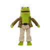 A plush toy of a green frog dressed in a brown jacket and beige pants.