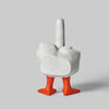 A white resin figurine shaped like a goose with a middle finger gesture.