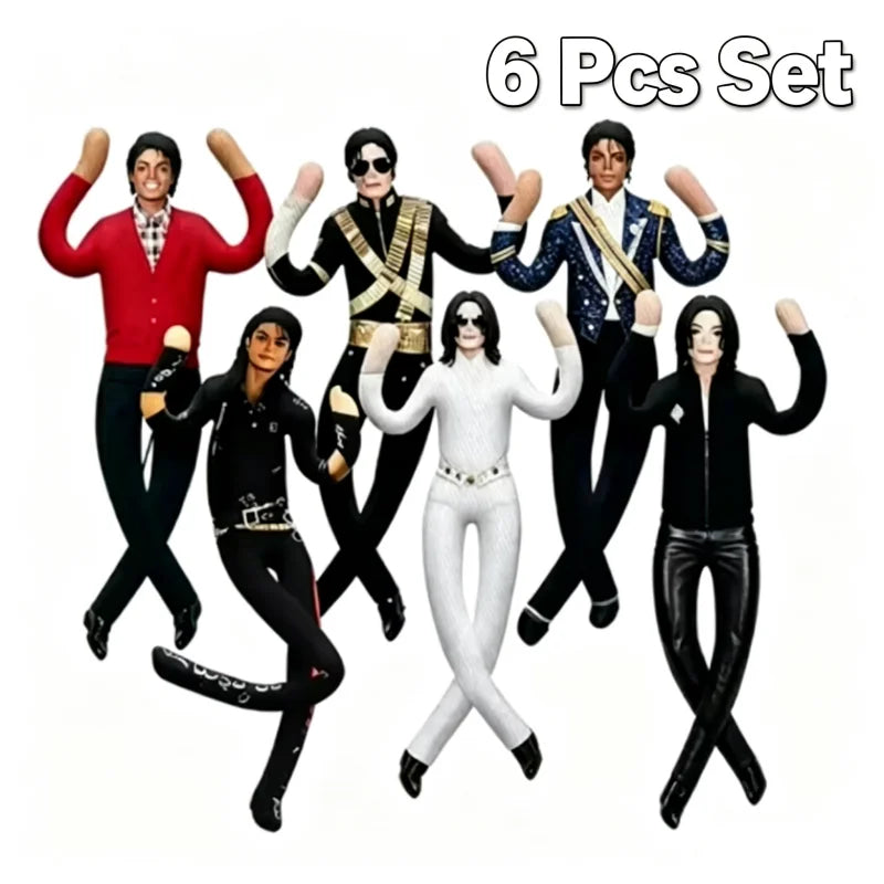 A set of six collectible plush dolls depicting Michael Jackson in various outfits and poses.