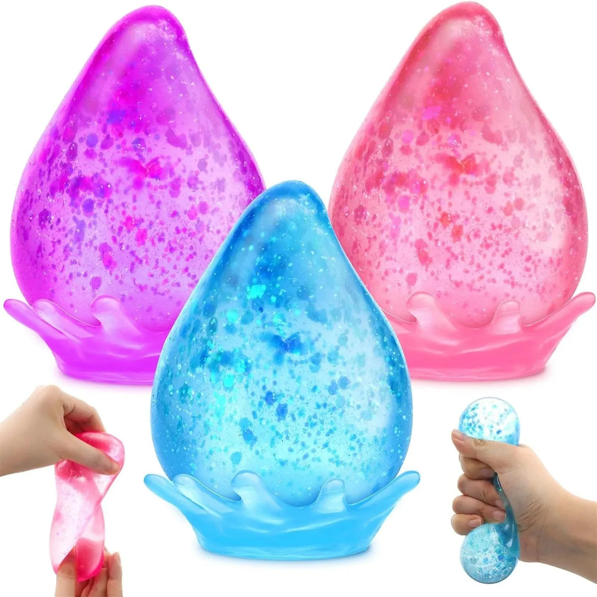 Three brightly colored silicone squishy stress balls in purple, pink, and blue are shown being squeezed by hands.