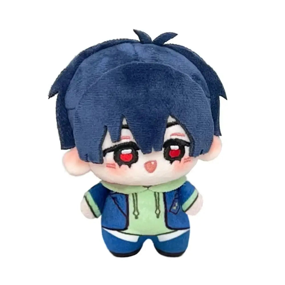 A plush doll of an anime character with dark blue hair and red eyes wearing a blue jacket.