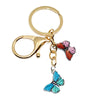 Gold-toned butterfly keychain with a pink and purple enamel butterfly charm
