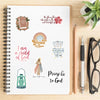 A notebook page featuring various religious and inspirational Bible verses and designs for stickers.