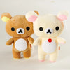 A pair of Kawaii Rilakkuma Strawberry Bear plush toys in brown and cream colors.