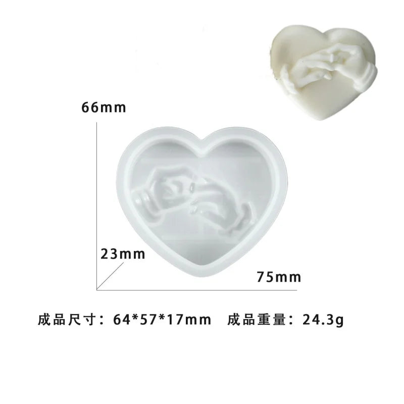 White heart-shaped silicone mold with dimensions 66mm by 23mm and 75mm.