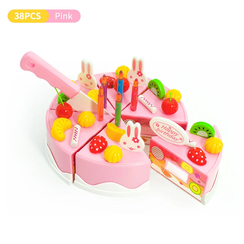 Pink pretend play birthday cake tea set with various pink and yellow food items and a pink knife