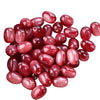 A pile of glossy, reddish-pink resin starry sky cat's eye beads for jewelry making.