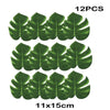 Twelve artificial tropical palm leaves measuring 11x15 cm for party decor
