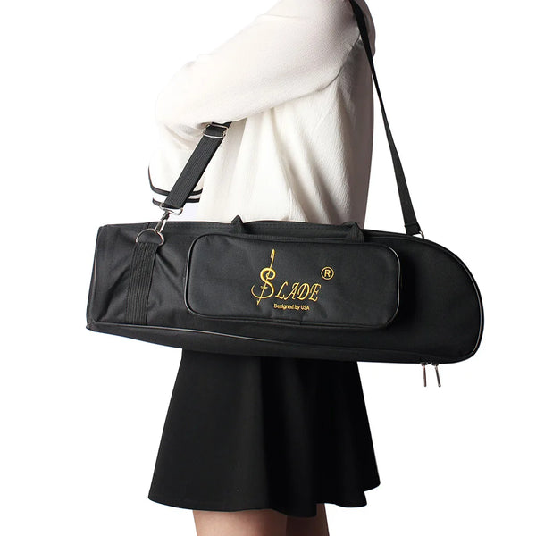 A black durable brass trumpet carrying bag is shown being carried by a person.