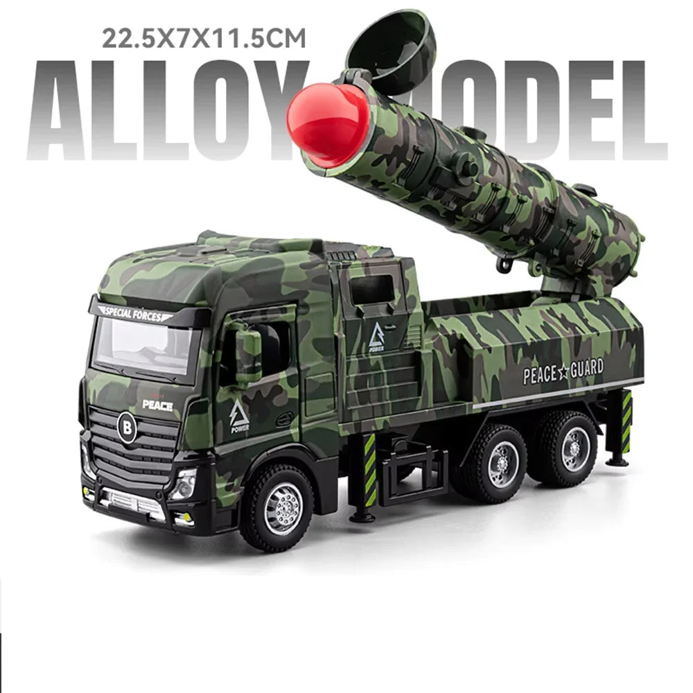 A diecast military missile truck toy in camouflage green, featuring a launch mechanism and a missile tube.