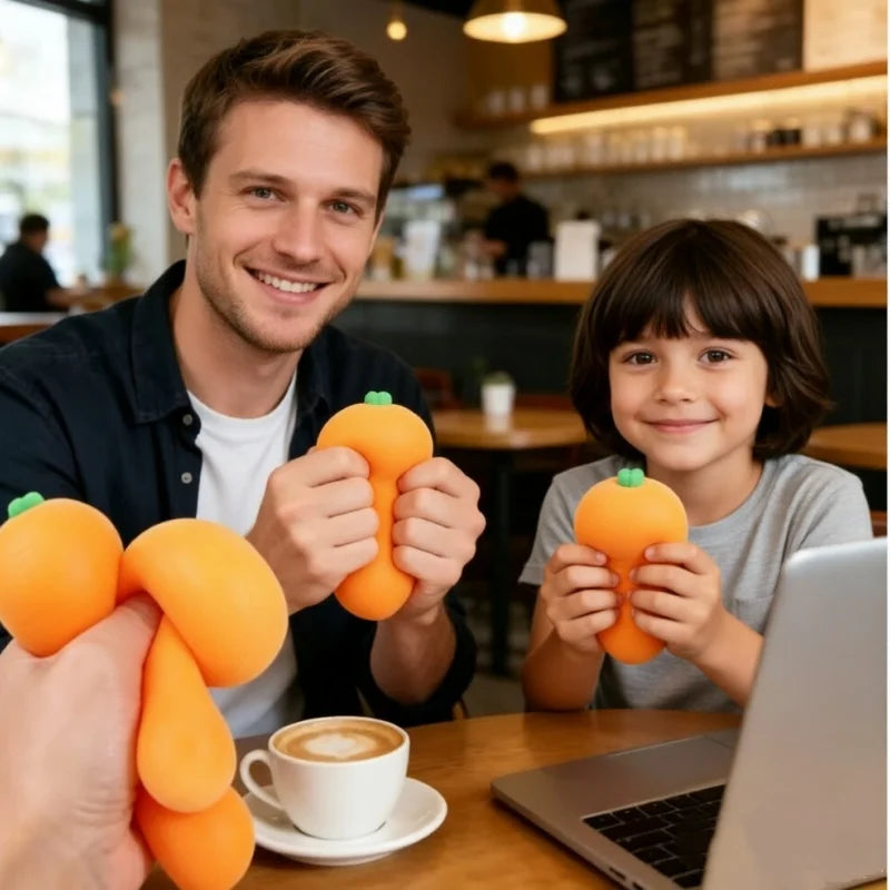 A man and a child are holding realistic orange carrot squishy toys in a cafe setting.