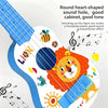 A blue ukulele with a round heart-shaped sound hole decorated with a lion face and musical notes.