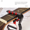 A silicone protective pad is shown clamped onto a guitar neck, demonstrating its anti-skid grip.