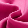 A close-up of a pink knitted cardigan fabric folded and draped.