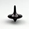 A black metal fidget spinner with a smooth, tapered top and wide base.