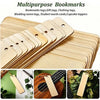 A set of ten wooden blank bookmarks with tassels are displayed on a light wooden surface.