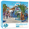 A box for the MaxRenard 1000 in Fira jigsaw puzzle featuring a scene with palm trees and buildings.