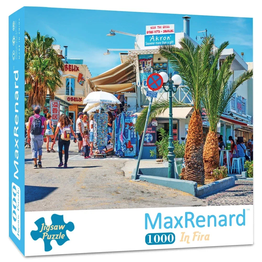 A box for the MaxRenard 1000 in Fira jigsaw puzzle featuring a scene with palm trees and buildings.