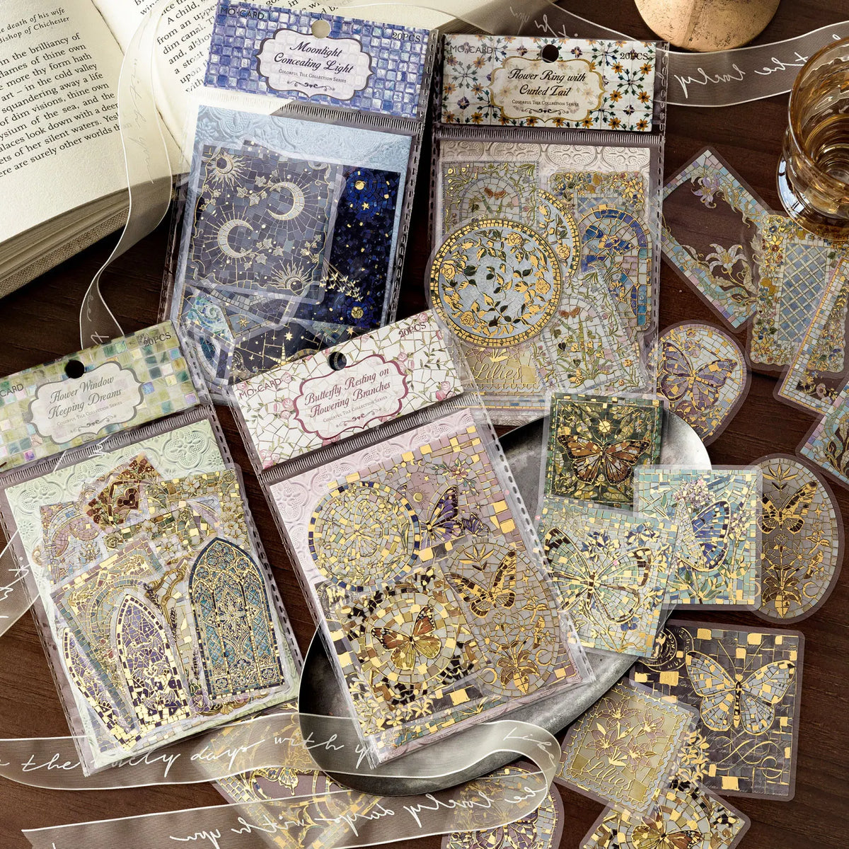 A collection of decorative PET stickers featuring gold and purple floral patterns for journaling and scrapbooking