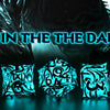 A set of polyhedral dice glowing in the dark against a dark background.
