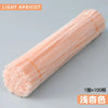 A light apricot colored chenille stem is shown in a diagonal view.