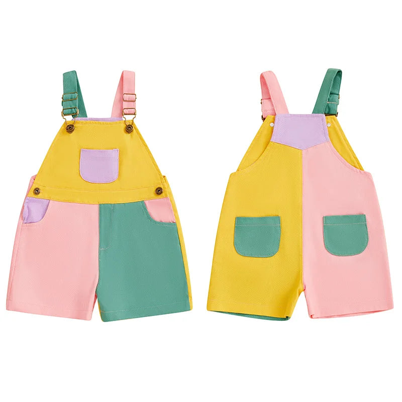A pair of summer contrast color overalls for toddlers in yellow, pink, and mint green.
